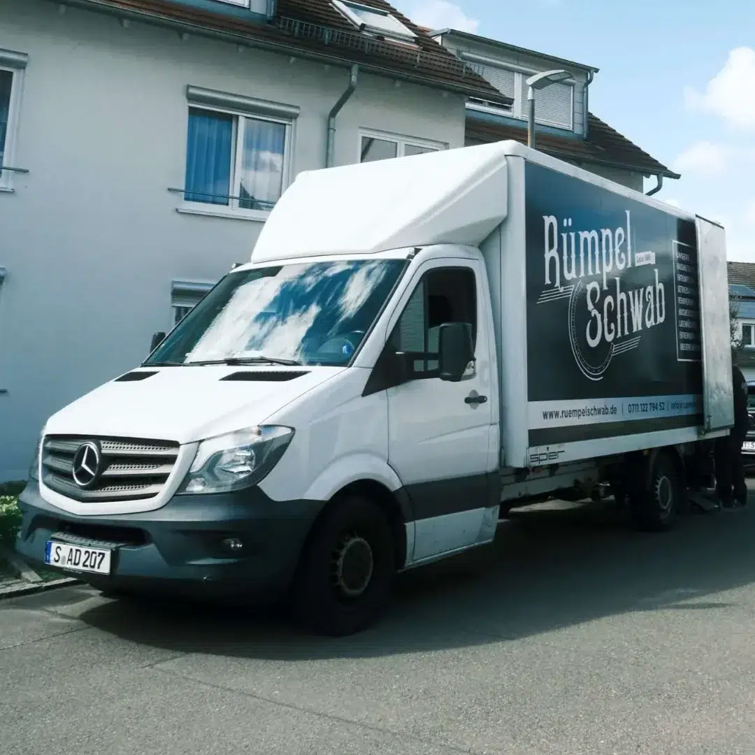 a white truck parked on the side of a road
